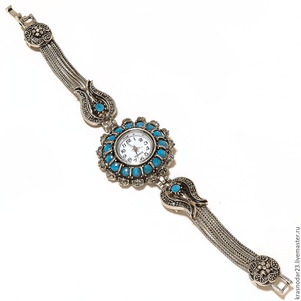 часы "Голубые мечты" из серебра с топазом