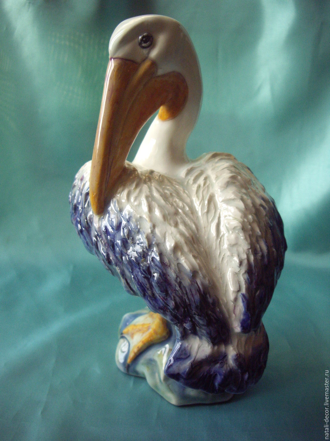 Пеликан белый