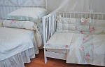 Комплект в кроватку для малыша и постельное белье для родителей