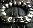 Кожаный браслет с серебряными головами ягуаров